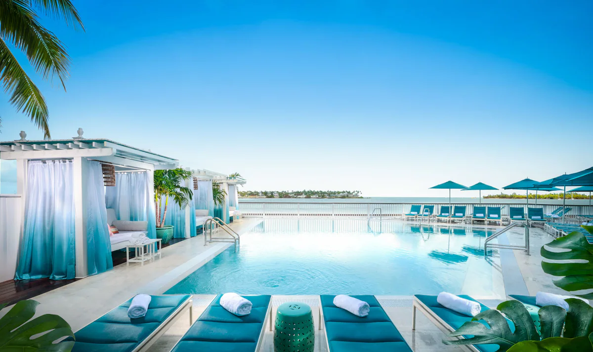 Bright waterfront pool and loungers at Ocean Key Resort & Spa in Key West